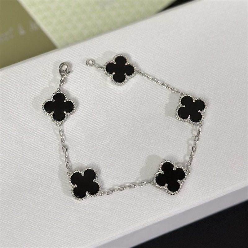 Silver Clover Stainless Steel Bracelet – A Statement of Elegance